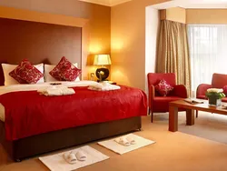 Burgundy Bed In The Bedroom Interior