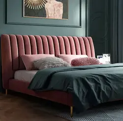 Burgundy bed in the bedroom interior
