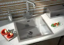 Stainless steel sink in the kitchen interior