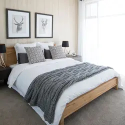 Gray bedspread in the bedroom interior