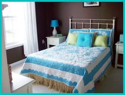 Turquoise bedspread in the bedroom interior