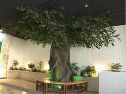 Artificial trees in the living room interior