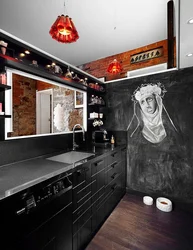 Black kitchen in loft interior