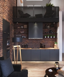 Black kitchen in loft interior