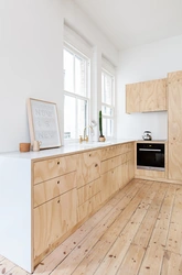 Kitchen made of plywood in the interior