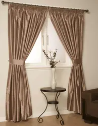 Sand curtains in the living room interior