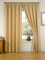 Sand curtains in the living room interior