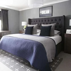 Bedroom interior with blue bedspread