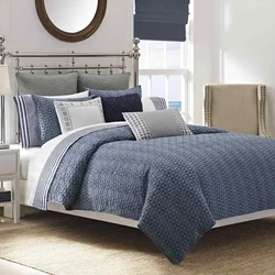 Blue Bedspread In The Bedroom Interior