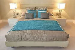 Blue bedspread in the bedroom interior