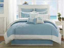 Blue bedspread in the bedroom interior