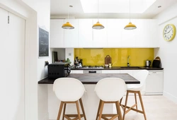 Yellow apron in the kitchen interior