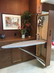 Ironing Board In The Bedroom Interior