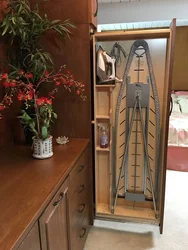 Ironing board in the bedroom interior