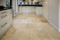 Beige porcelain tiles in the kitchen interior