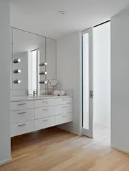 White door in the bathroom interior