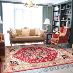 Soviet carpet in the living room interior