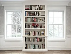 White bookcase in the living room interior