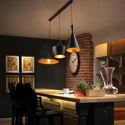 Loft chandelier in the kitchen interior