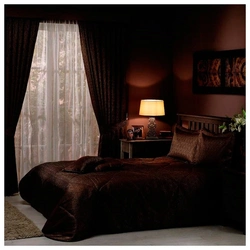 Chocolate curtains in the bedroom interior