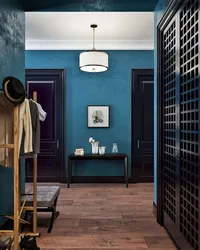 Blue door in the hallway interior
