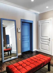 Blue door in the hallway interior