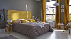 Mustard Bed In The Bedroom Interior