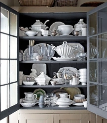 White dishes in the kitchen interior