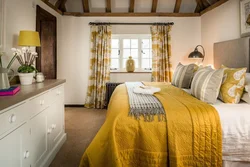 Mustard curtains in the bedroom interior