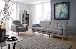 Sofa with legs in the living room interior