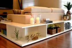 Console for a sofa in the living room interior