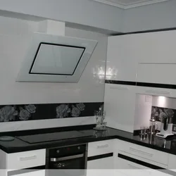 Glass hood for the kitchen in the interior