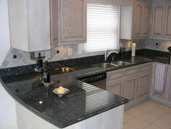 Gray marble countertop in the kitchen interior