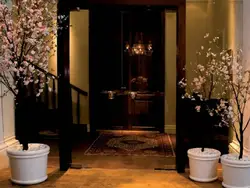 Artificial Flowers For The Interior In The Hallway