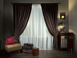 Velvet gray curtains in the living room interior