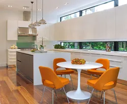 Orange chairs for the kitchen in the interior