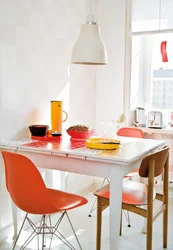 Orange chairs for the kitchen in the interior