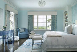Gray-blue curtains in the bedroom interior
