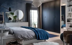 Gray blue bed in the bedroom interior