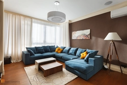Living room interior with corner white sofa