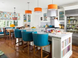 Blue chairs in the interior of a white kitchen