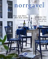 Blue chairs in the interior of a white kitchen