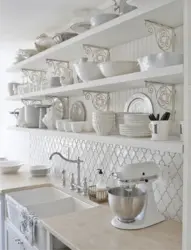 White shelves in the kitchen interior