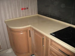 Semolina beige countertop in the kitchen interior