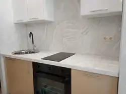 Semolina beige countertop in the kitchen interior
