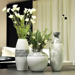 Vase With Flowers In The Kitchen Interior