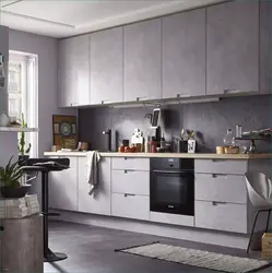 Gray kitchen with concrete look in the interior