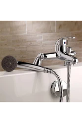 Faucet on board the bathtub in the interior