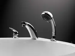 Faucet on board the bathtub in the interior