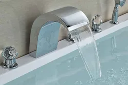 Faucet on board the bathtub in the interior